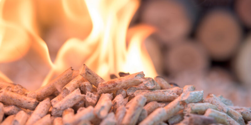 Pellets,In,Flames-,Oak,Biomass,,Close,Up